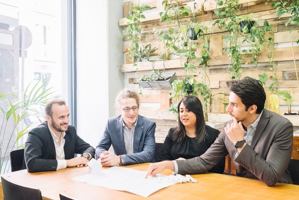 The PropXper team working together to support expats